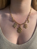 Vaïana - Collier charms Lily Blue