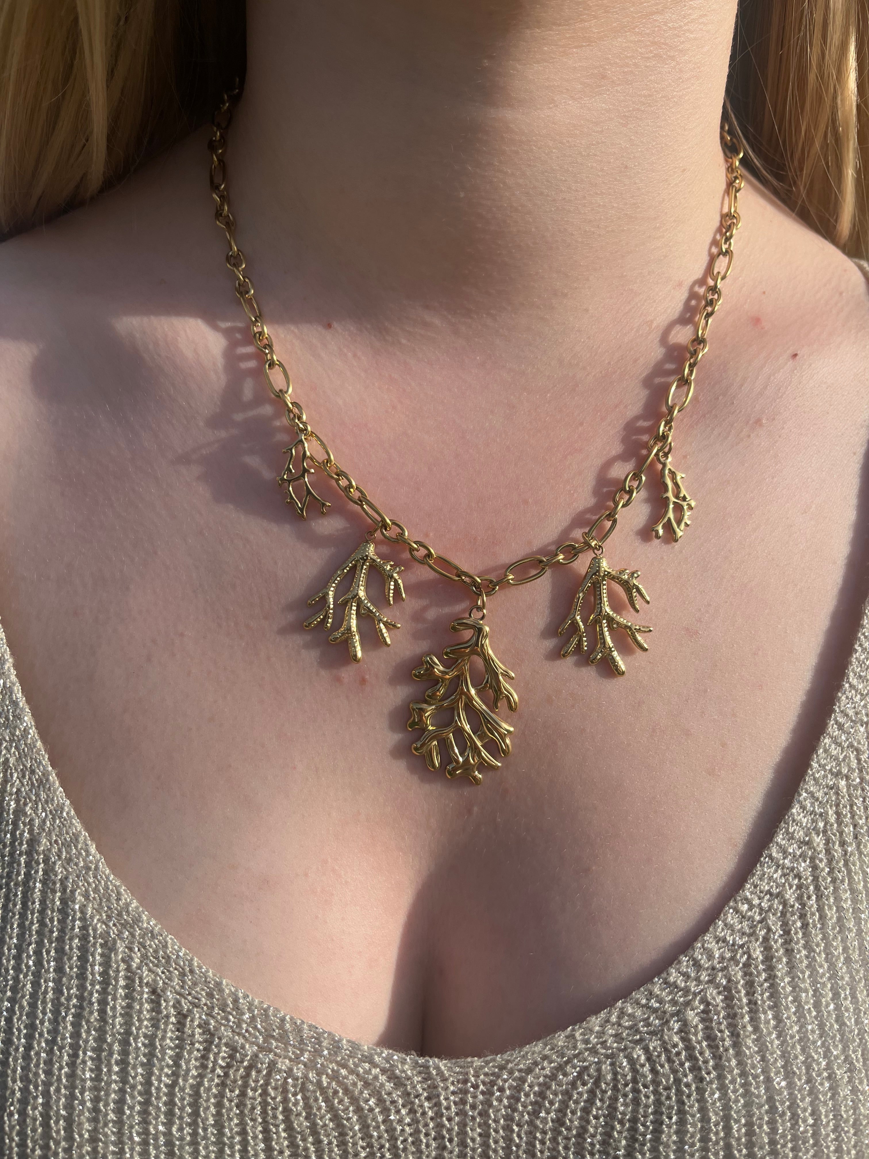 Vaïana - Collier charms Lily Blue